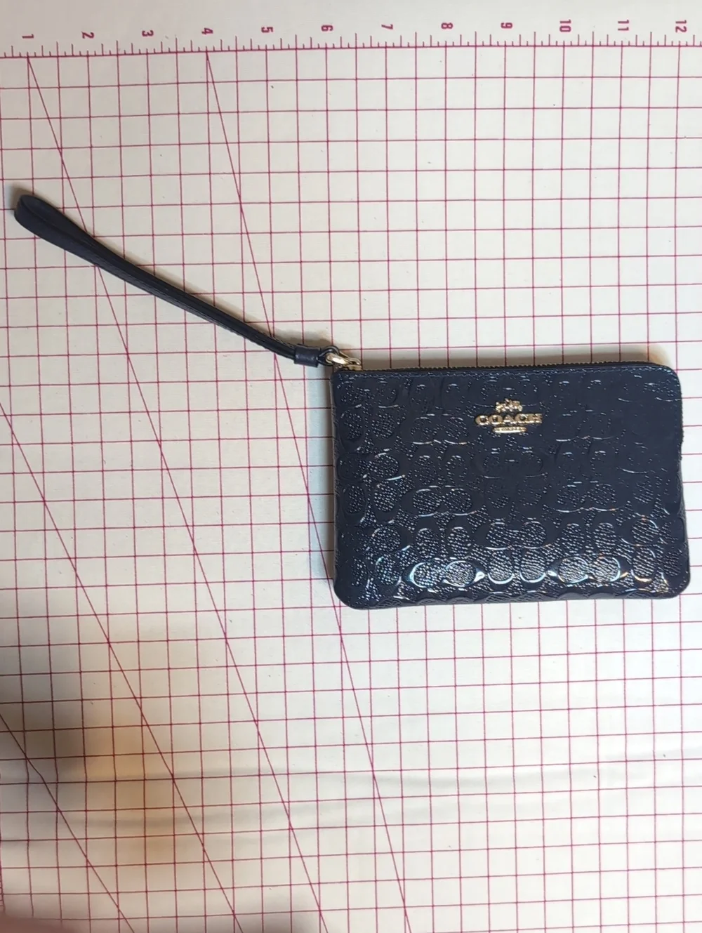 Coach wristlet embossed